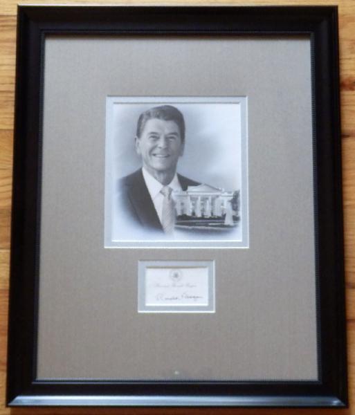 Ronald Reagan Unique Newspaper Artwork Portrait with inset of the White House Framed with a Signed Post-It-Note